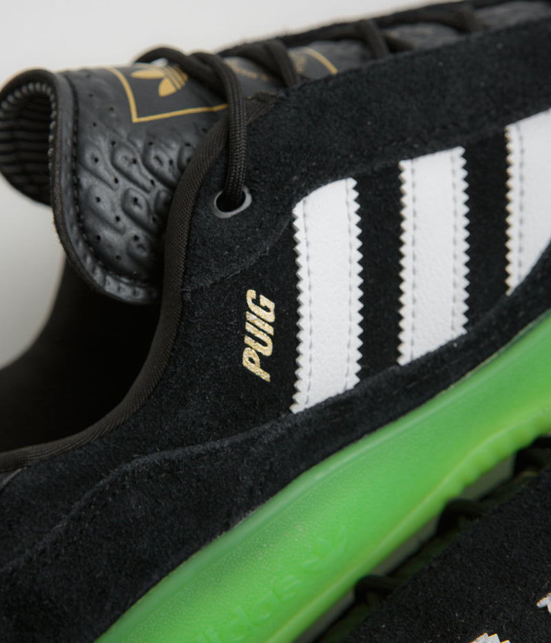 Adidas Puig Shoes in Core Black and FTWR White / Semi Solar Green