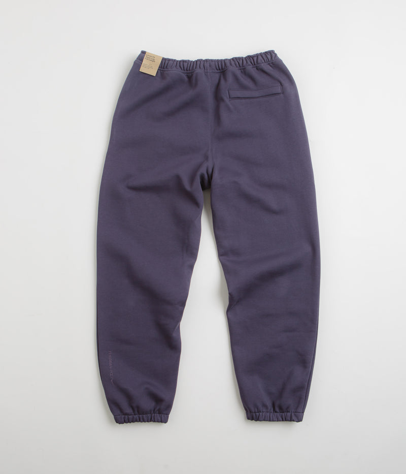 Nike ACG Tuff Fleece Lungs Pants in Dark Raisin and Safety Orange / Summit White