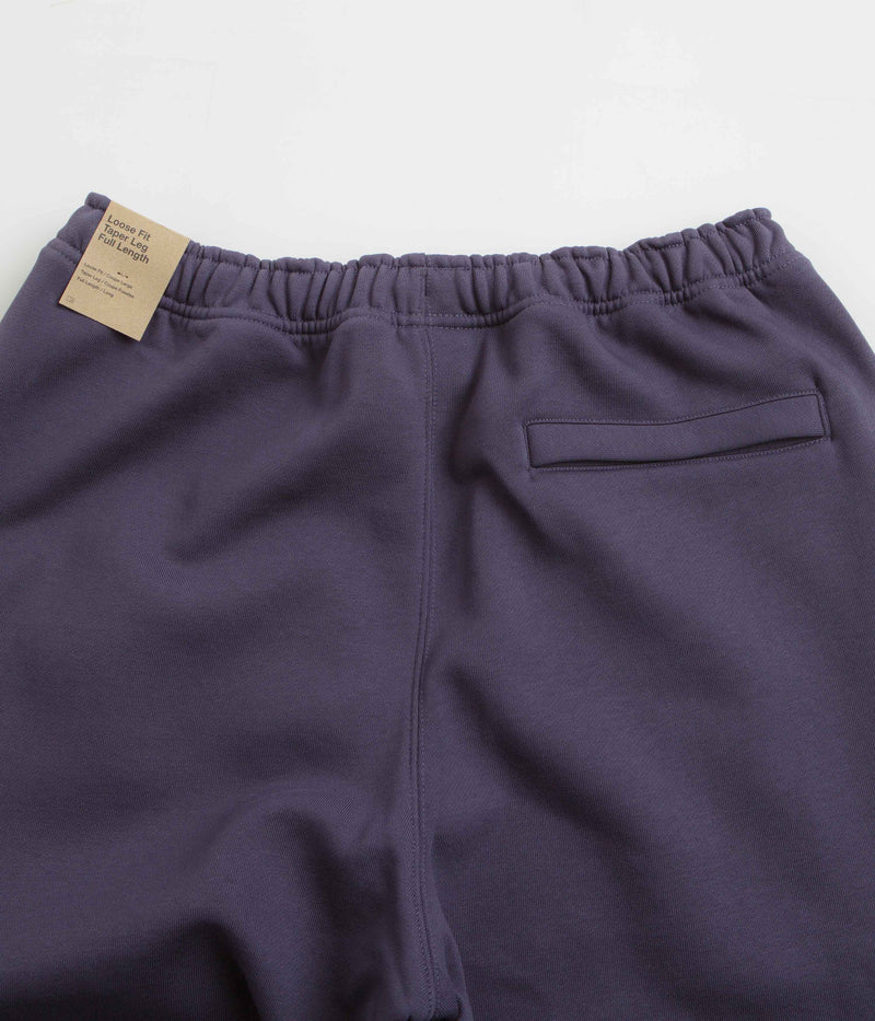 Nike ACG Tuff Fleece Lungs Pants in Dark Raisin and Safety Orange / Summit White