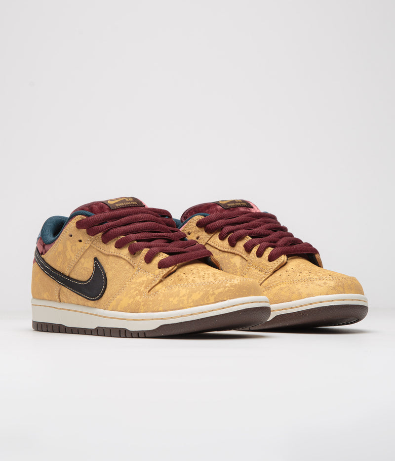 Nike SB Dunk Low Pro ‘City of Cinema’ Shoes in Celestial Gold and Black and Dark Team Red