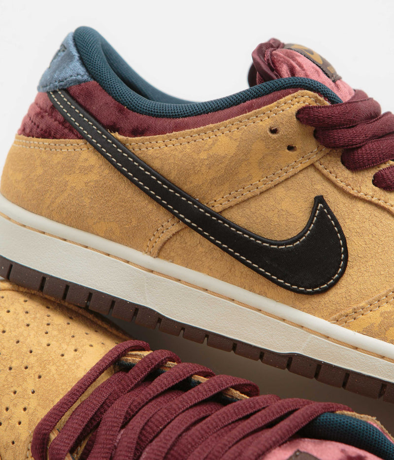 Nike SB Dunk Low Pro ‘City of Cinema’ Shoes in Celestial Gold and Black and Dark Team Red