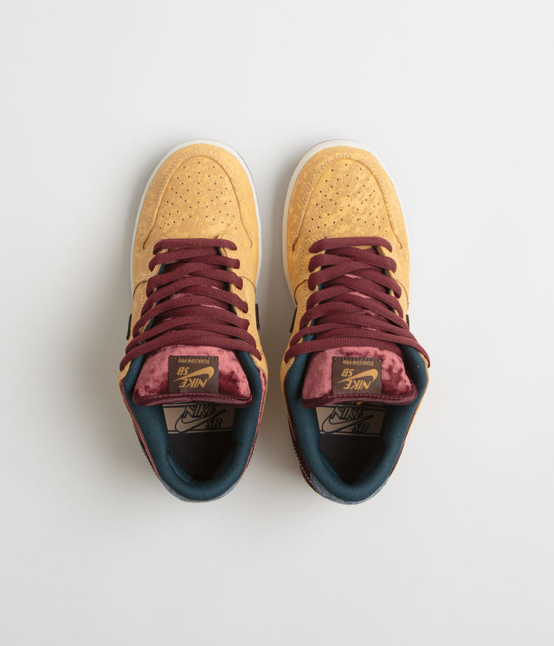 Nike SB Dunk Low Pro ‘City of Cinema’ Shoes in Celestial Gold and Black and Dark Team Red