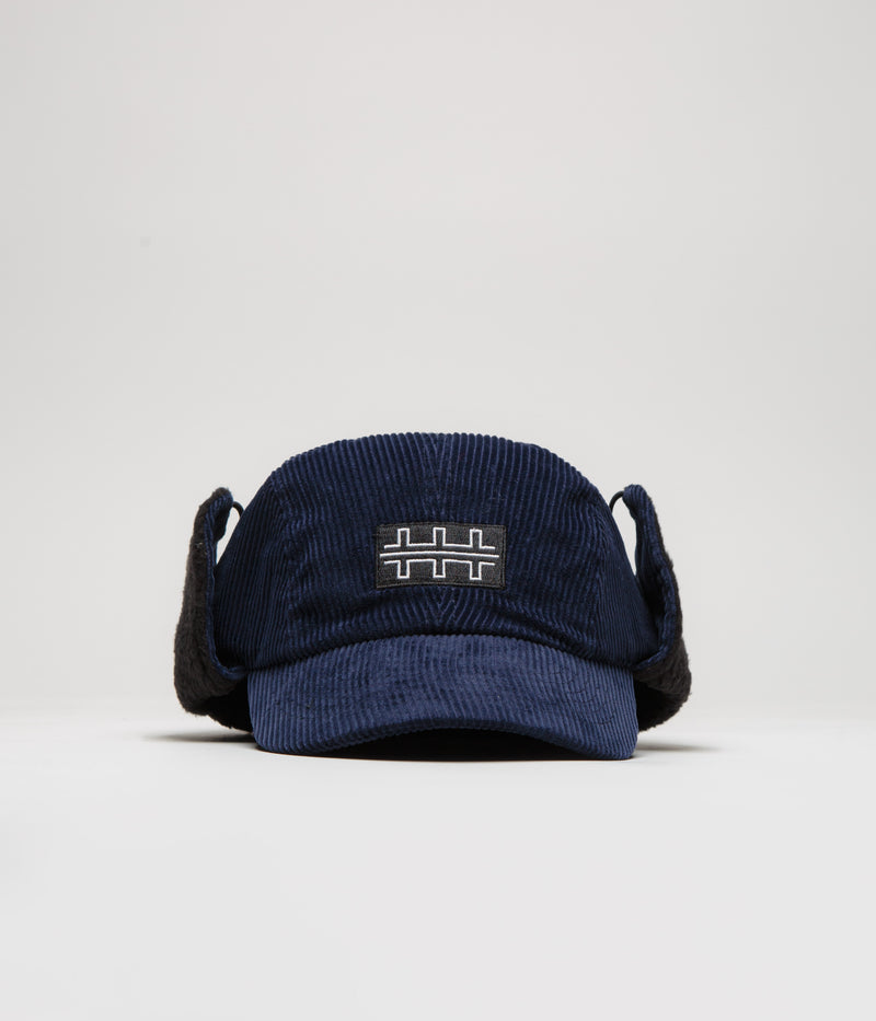 The Trilogy Tapes Cord Earflap Cap in Navy